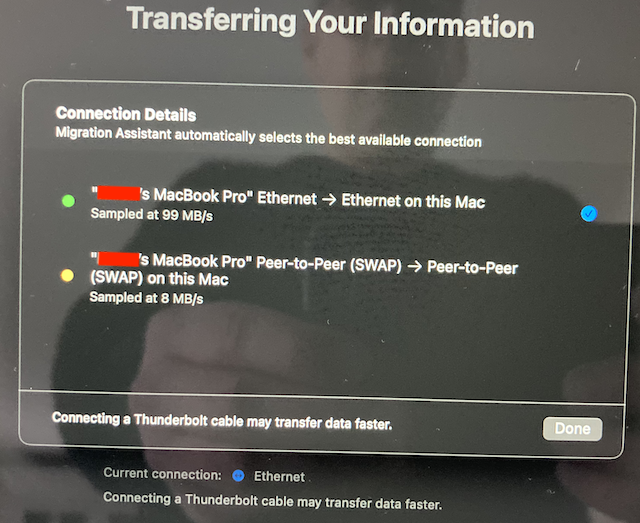 Transfer options window in the macOS Migration Assistant, also: reflection of yours truly taking an actual 'screenshot'